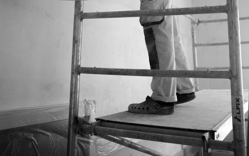 Painter on a scaffold (illustrative image)